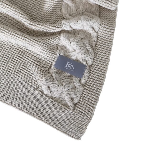 Soft knitted blanket in beige